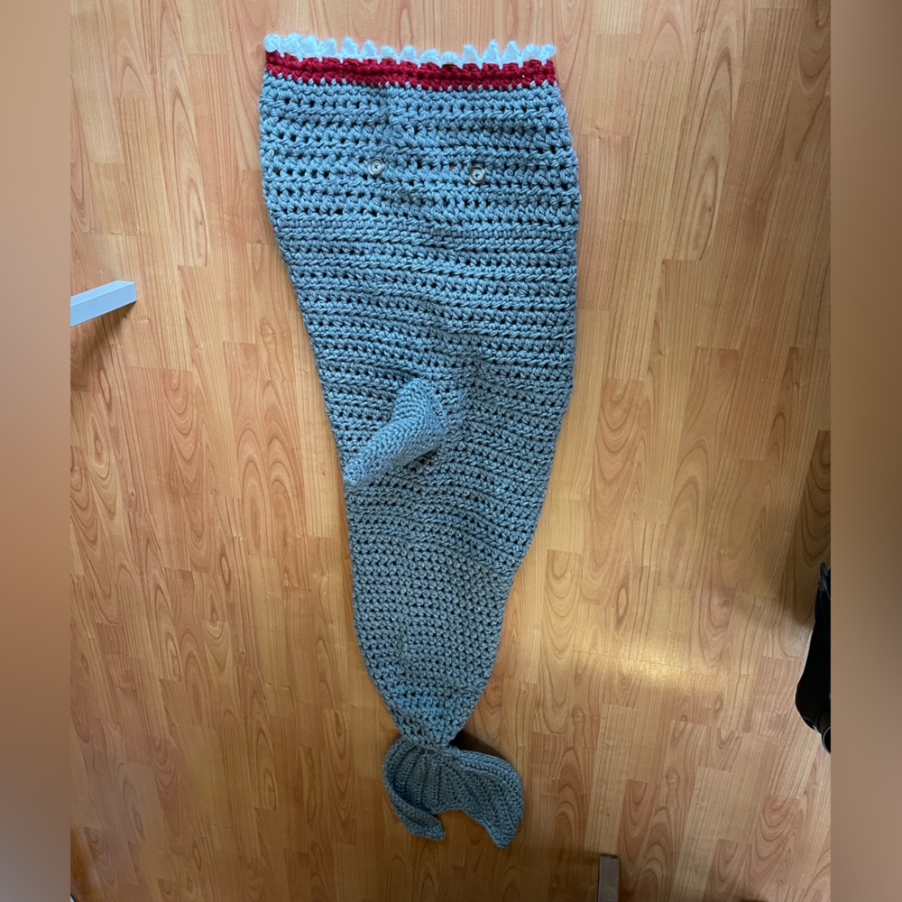 Handmade crocheted shark blanket.